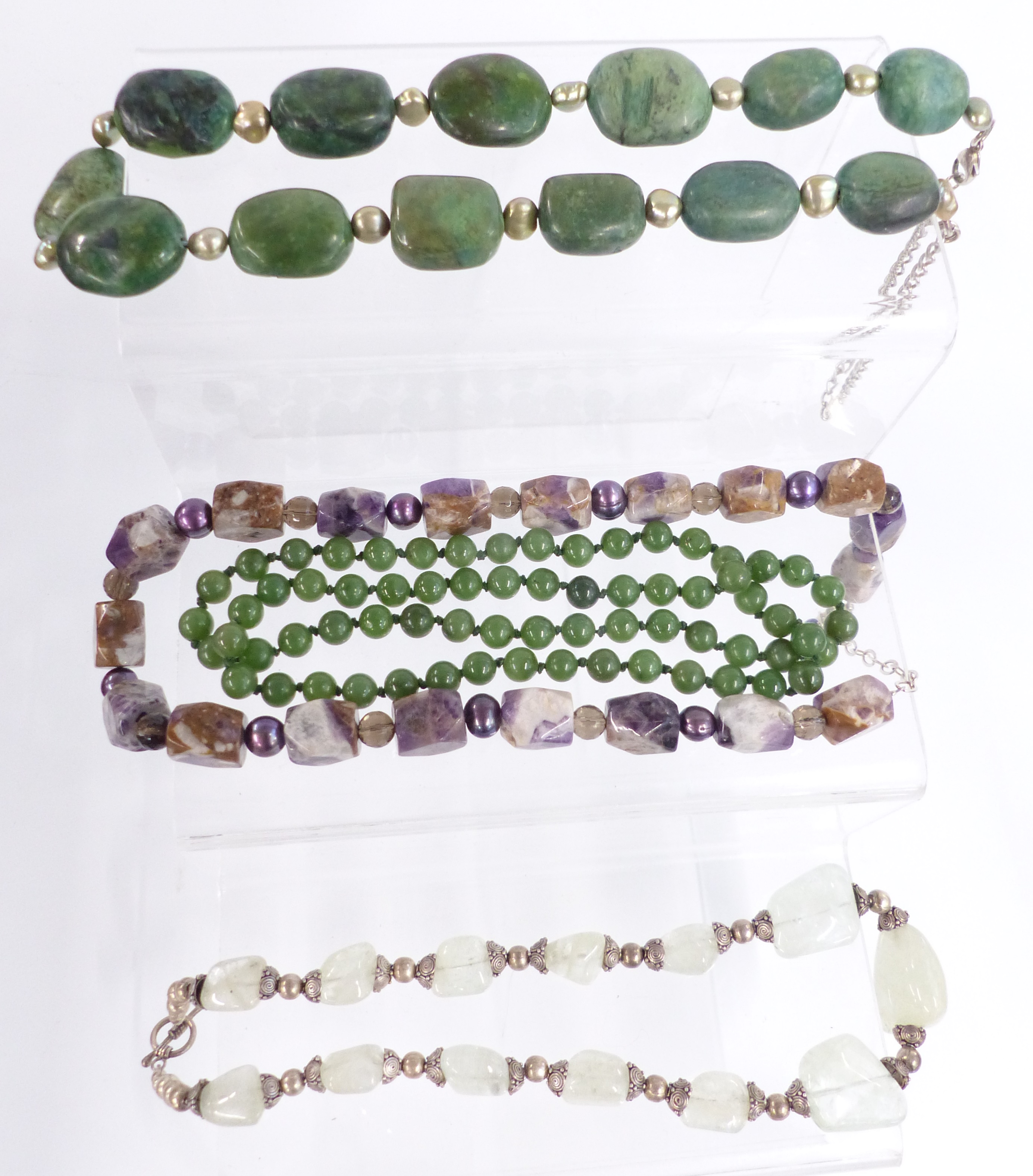 A large collection of beaded necklaces including nephrite jade, pearl, pressed amber, quartz, glass, - Image 2 of 5