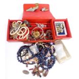 A collection of costume jewellery including silver bangle, silver butterfly wing brooch, Capri