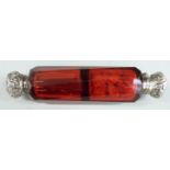 Double ended cranberry glass scent bottle with white metal mounts, length 13cm