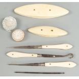 Sewing collectables to include two mother of pearl pin cushions, two ivory mounted winders and three