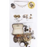 A collection of jewellery and watches including Art Deco brooch, Bravingtons ring sizer, diamanté