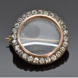 Victorian locket brooch set with foiled paste, 2.3cm diam