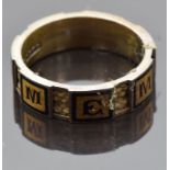 Victorian 15ct gold mourning ring set with plaited hair and raised black enamel sections reading "