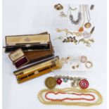A collection of costume jewellery including Hollywood brooches, vintage brooch box, agate