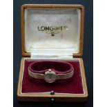 Longines 9ct gold ladies wristwatch ref. 29206 with gold hands and baton markers, silver dial and