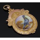 A 9ct rose gold fob set with an enamel pigeon, Birmingham 1930, 11.2g