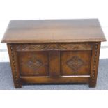 A small oak coffer with carved decoration, W77 x D38 x H48cm