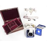 A collection of jewellery including Swarovski bracelet, silver earrings, ring, and a necklace set