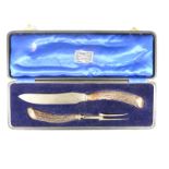 Hallmarked silver mounted horn handled carving set, Sheffield 1931 makers mark TEO, in Oswin & Co.