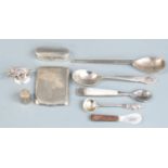 Three hallmarked silver and white metal spoons, hallmarked silver match case and a silver lidded