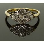 An 18ct gold ring set with diamonds in a platinum setting, size N, 2.10g