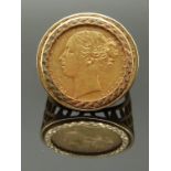 An 1880 gold full sovereign in 9ct gold ring mount, size U, 13.58g