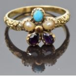 An early Victorian ring set with turquoise, two pearls and amethyst, with engraved shoulders, size