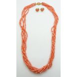 A five strand coral necklace with 18ct gold clasp and a pair of 18ct gold matching earrings
