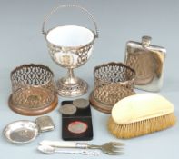 Pair of silver plated wine coasters, swing handled basket with glass liner, silver plated hip flask,