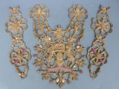 A 19th/20thC stumpwork/ embroidered armorial with a pair of side panels decorated with sequins and