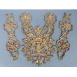 A 19th/20thC stumpwork/ embroidered armorial with a pair of side panels decorated with sequins and