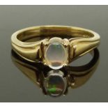 A 9ct gold ring set with an opal, size N, 2.57g