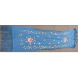 A 19th/20thC Chinese blue scarf with embroidered floral decoration and fringes, 180 x 45cm including