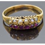 Victorian yellow metal ring set with seed pearls and foiled rubies, size M