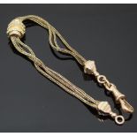 A 19thC 15k gold three strand leontine/ fob chain with bi-coloured fittings, 6.2g