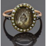 Georgian mourning ring set with an ivory plaque depicting a willow tree and urn surrounded by seed
