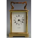 H.Samuel 20thC brass carriage clock in corniche style case, the painted white Roman dial with Arabic