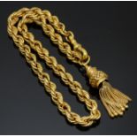 A 19thC yellow metal rope twist leontine/ fob chain with a tassel, 13.7g