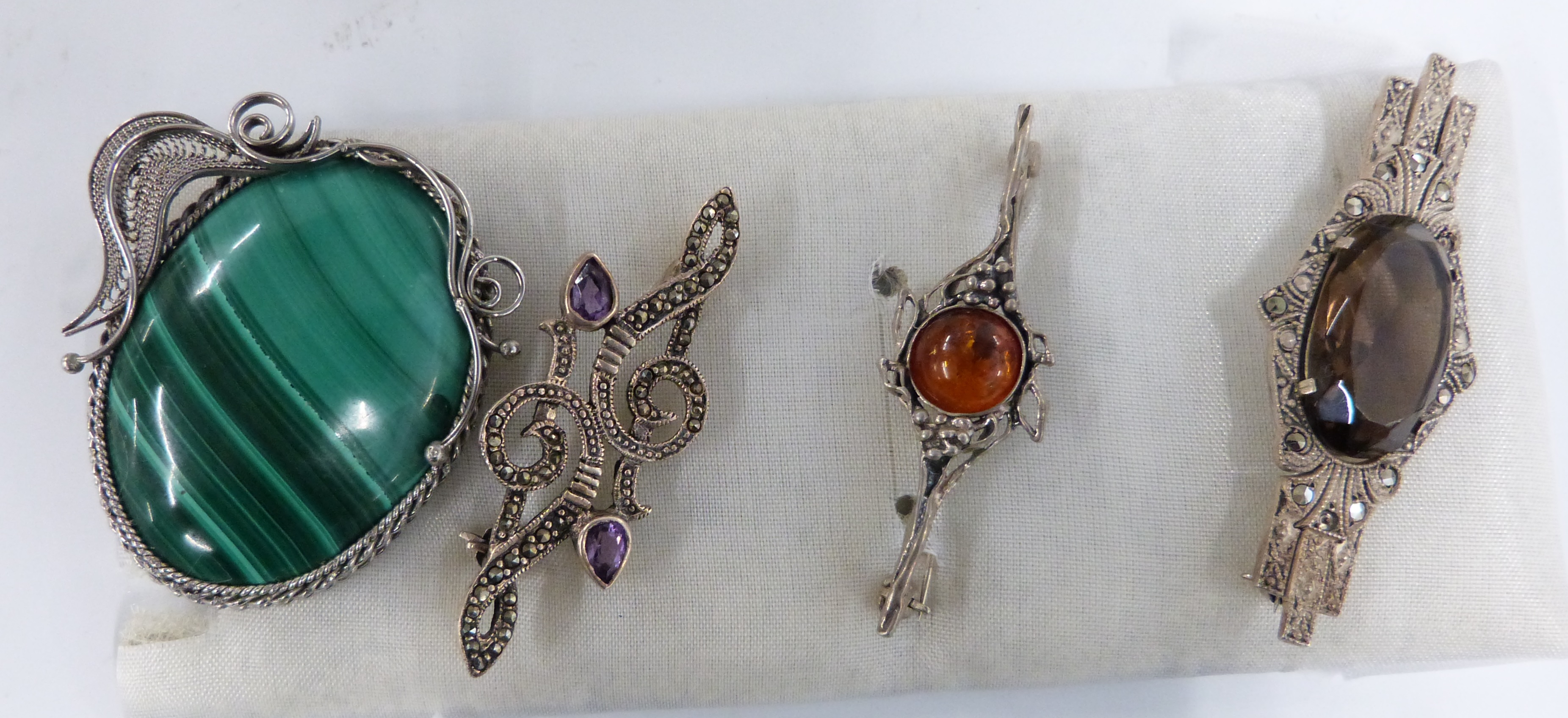 A collection of silver jewellery including malachite, pressed amber and quartz brooches, earrings, - Image 2 of 6