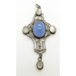 Arts and Crafts pendant set with a blue agate and moonstone cabochons