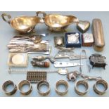 Silver plated items including cutlery, pair of heavy plated gravy boats, napkin rings, hallmarked