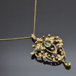 Edwardian 15ct gold pendant set with two pear cut peridots and seed pears on a 15ct gold chain, 6