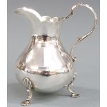 Victorian hallmarked silver jug, raised on three feet, London 1868 maker Richards & Brown, height