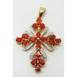 A 9ct gold pendant set with pear cut Mexican fire opals and diamonds, 6.2g