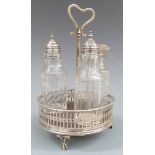 Georgian hallmarked silver mounted cruet stand with pierced decoration and raised on three feet,