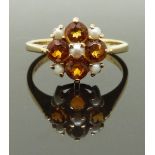 A 9ct gold ring set with pearls and citrine, size L, 2.43g