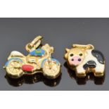 Two 9ct gold and enamel charms, one in the form of a cow and the other a motorbike, 2.8g