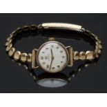 Omega 9ct gold ladies wristwatch ref.7115500 with gold hands and Arabic numerals, silver dial and