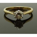 An 18ct gold ring set with a round cut diamond of approximately 0.5ct, size O, 2.99g
