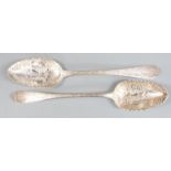Two Georgian hallmarked silver berry spoons with vine decoration, different dates and makers circa