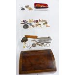 An amber cheroot holder with 9ct gold mount, silver brooches, etc in a wooden box