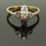 A 9ct gold ring set with diamonds in a platinum setting, 1.7g, size K