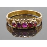 Victorian 15ct gold ring set with foiled rubies and garnets, with an engraved band, size O