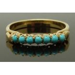An 18k gold ring set with turquoise, size O, 2.38g