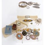 A collection of costume jewellery including brooches, silver bangle, silver ring, Art Deco collar,