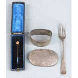 Cased gold stick pin set with a seed pearl, hallmarked silver napkin ring, hallmarked silver lid and