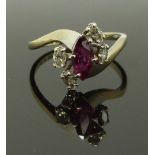 An 18ct white gold ring set with a marquise cut ruby and diamonds, in Martin & Co box, 3.1g, size O
