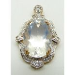 A 9ct gold pendant set with an oval cut ice opal and zircon, 6.9g