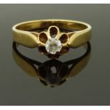 An 18ct gold ring set with paste, size N, 3.00g