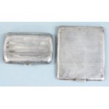 Hallmarked silver cigarette case together with a further cigarette case marked Sterling, weight
